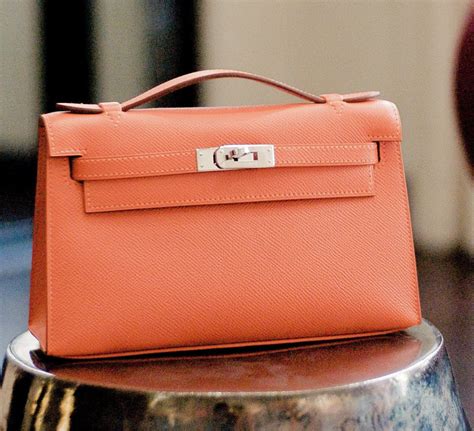 hermes kelly pochette orange|hermes kelly pochette price 2023.